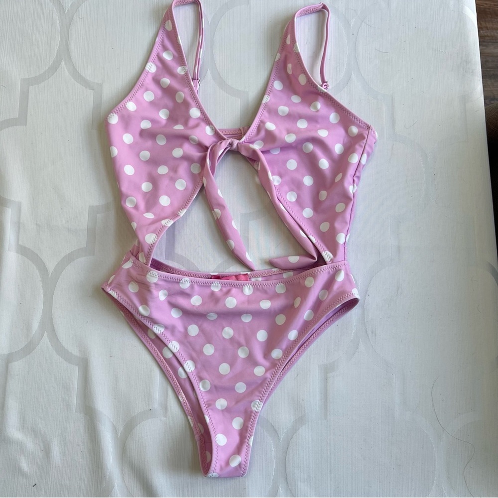 Dolls Kill Sugar Thrillz Walk the Line pink polka dot cutout one piece swimsuit